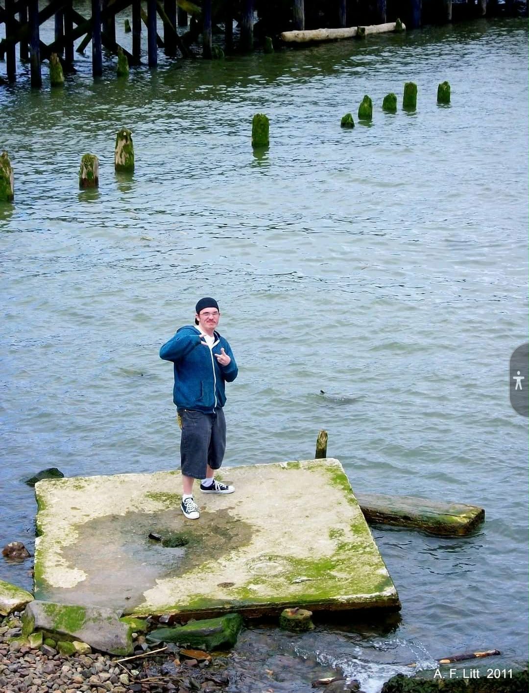 A loved one standing by the water