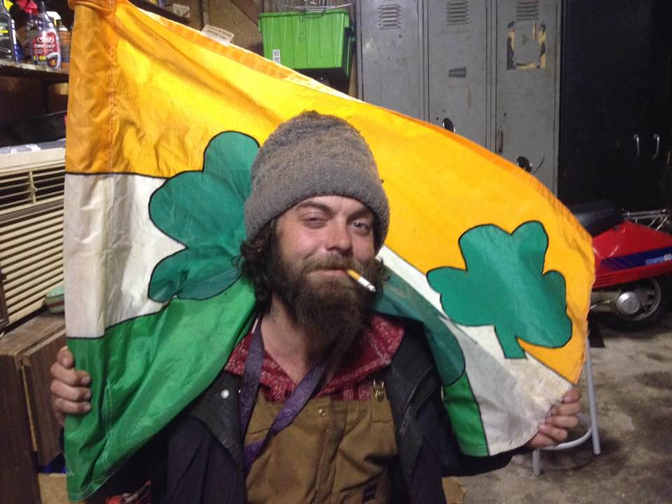 A loved one holding an Irish flag