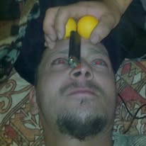 A close-up of a loved one joking with small yellow objects
